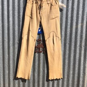 Ralph Lauren leather pants with embellishments.